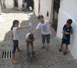 Having fun with a bottle of water in Algeria